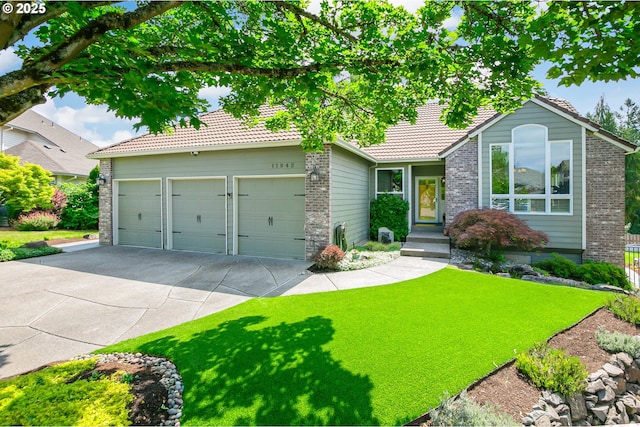 11942 SE Sunny Way, Happy Valley, OR 97086 - ranch-style home featuring a tile roof, brick siding, concrete driveway, and an attached garage