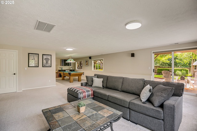 11942 SE Sunny Way, Happy Valley, OR 97086 - carpeted living room with billiards table, a textured ceiling, and baseboards
