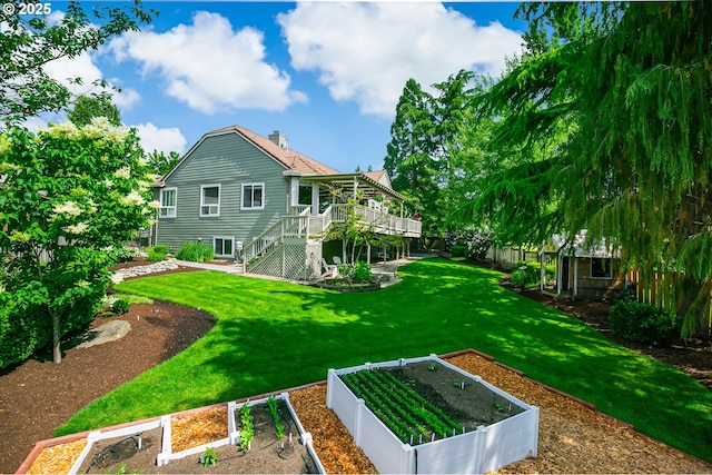 11942 SE Sunny Way, Happy Valley, OR 97086 - back of house with a garden, stairway, and a deck