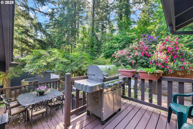 2002 Kimberly Dr, Eugene, OR 97405 - deck with a grill and outdoor dining space