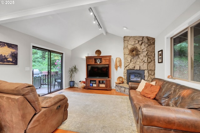 2002 Kimberly Dr, Eugene, OR 97405 - living area with light wood-style floors and a fireplace
