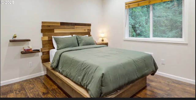 23218 E Homer Ave, Welches, OR 97067 - bedroom with baseboards and wood finished floors