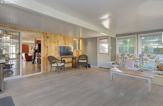 sunroom with beam ceiling