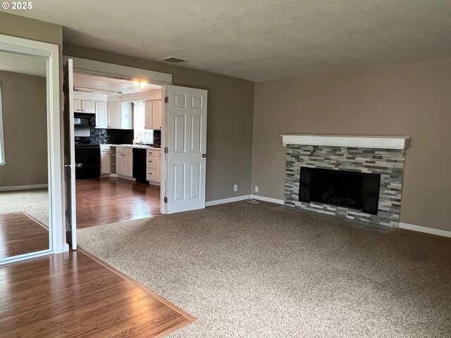 unfurnished living room with carpet flooring