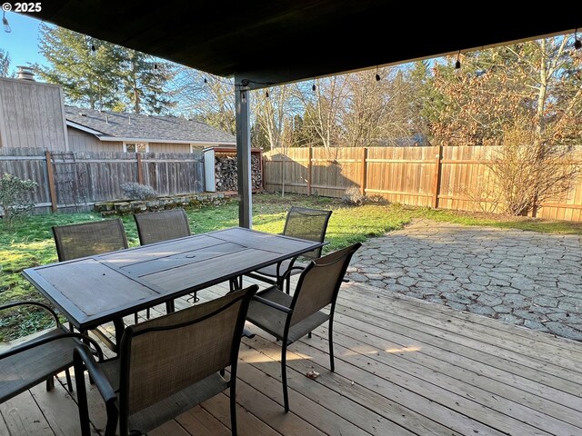 view of yard featuring a wooden deck