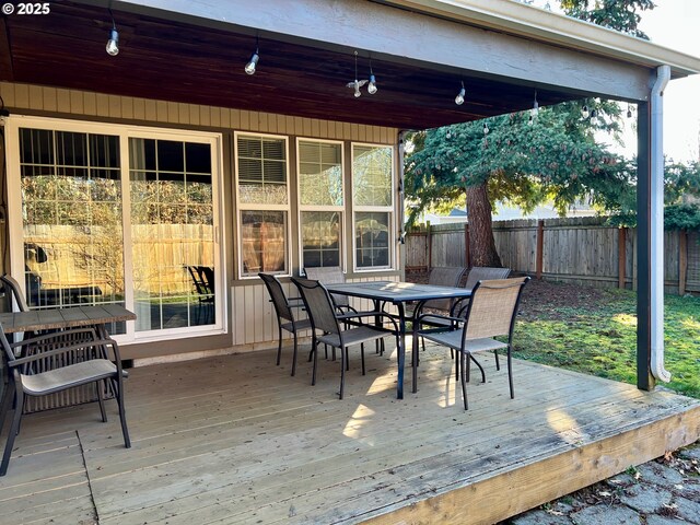 rear view of property featuring a yard and a patio