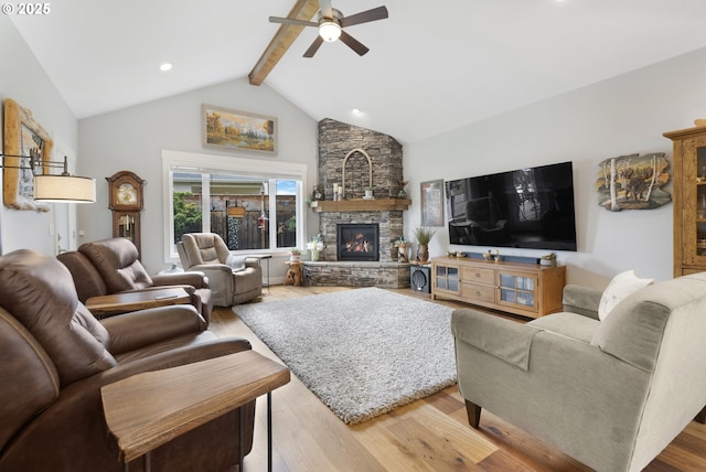 3461 Sterling Woods Dr, Eugene, OR 97408 - living area with beamed ceiling, ceiling fan, light wood-style flooring, a stone fireplace, and high vaulted ceiling