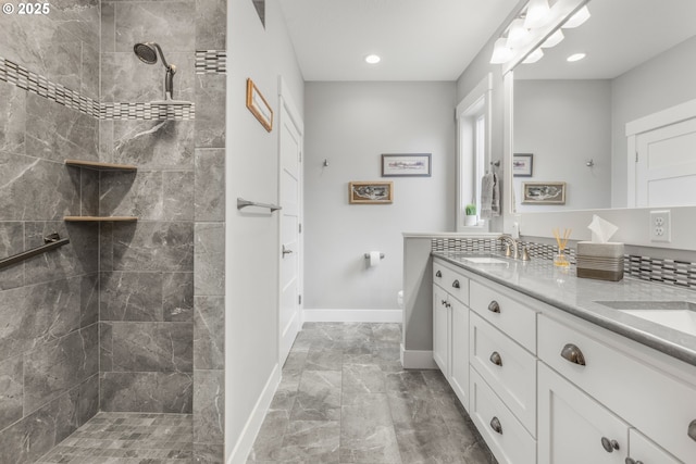 3461 Sterling Woods Dr, Eugene, OR 97408 - full bath featuring double vanity, marble finish flooring, a tile shower, and recessed lighting