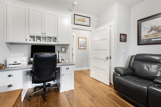 3461 Sterling Woods Dr, Eugene, OR 97408 - office area featuring built in study area and light wood finished floors