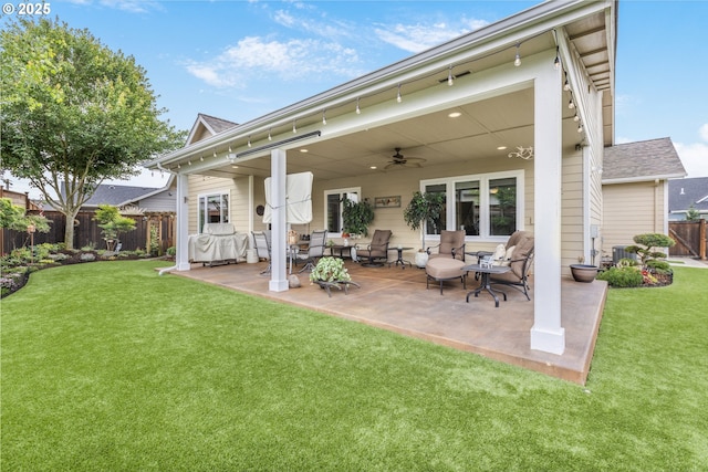 3461 Sterling Woods Dr, Eugene, OR 97408 - back of house with a ceiling fan, a fenced backyard, a patio area, a shingled roof, and an outdoor living space