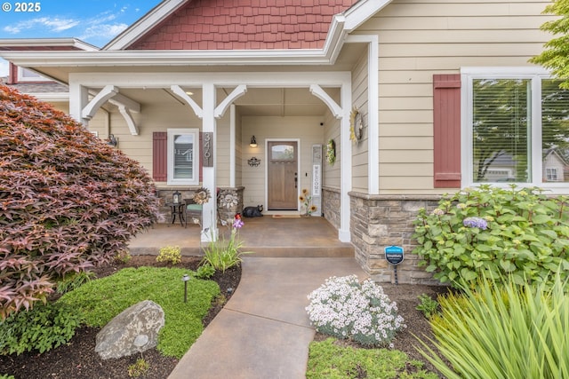 3461 Sterling Woods Dr, Eugene, OR 97408 - doorway to property featuring a porch and stone siding