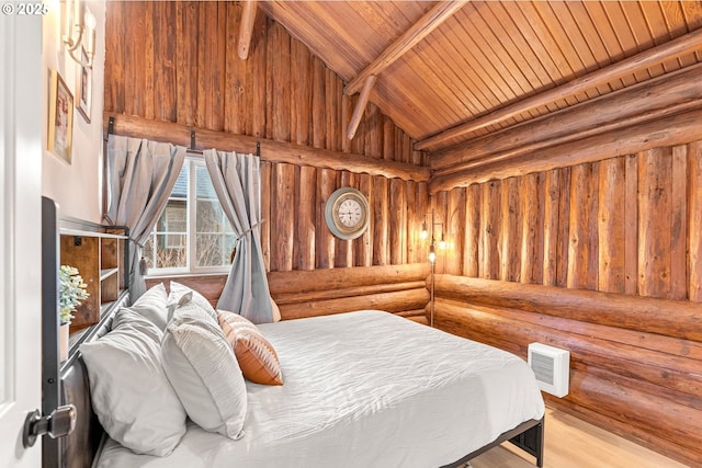 bedroom with vaulted ceiling with beams, wood ceiling, light hardwood / wood-style floors, and rustic walls