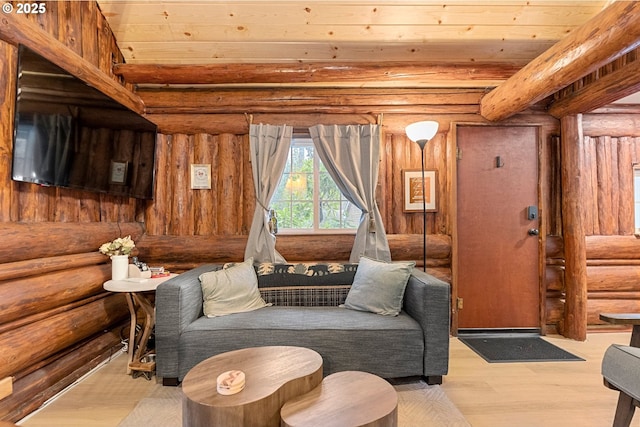 living area featuring wooden ceiling, log walls, beam ceiling, and light wood-type flooring