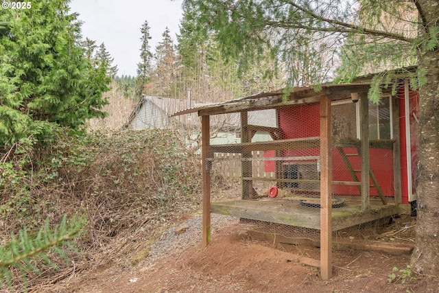 view of yard with an outbuilding and exterior structure