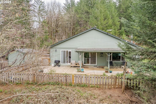 back of house with a patio and fence private yard