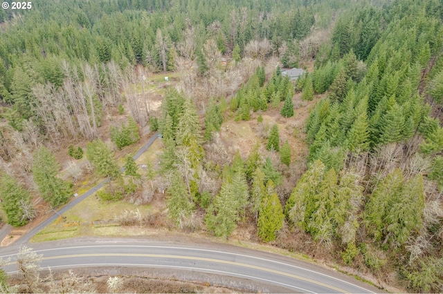 aerial view featuring a forest view