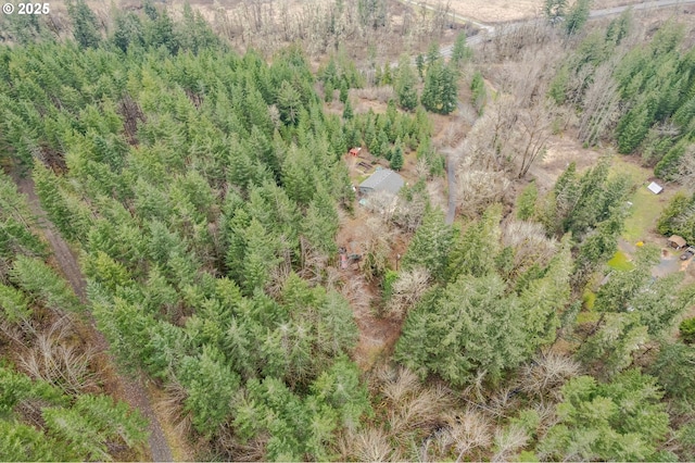 aerial view featuring a view of trees