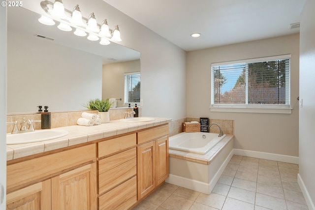 full bath with a sink, visible vents, and tile patterned floors
