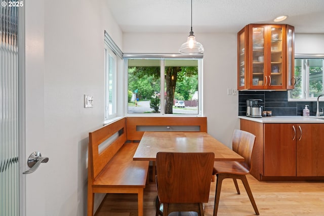 9004 SW 36th Ave, Portland, OR 97219 - dining space featuring light wood finished floors and a textured ceiling