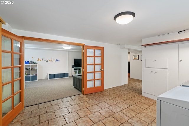 9004 SW 36th Ave, Portland, OR 97219 - spare room featuring washer / dryer and french doors