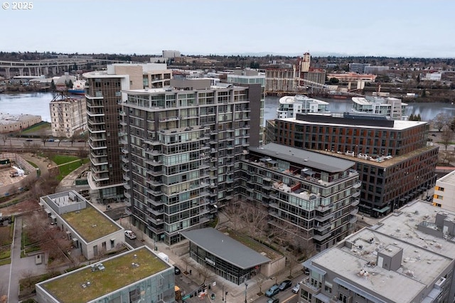 bird's eye view with a water view and a view of city