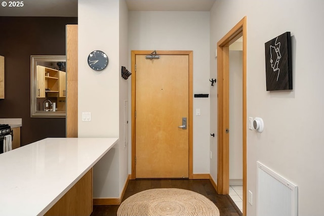 interior space with radiator heating unit and baseboards