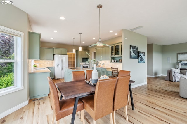 15745 SE Bybee Dr, Portland, OR 97236 - dining area with baseboards, recessed lighting, and light wood-style floors