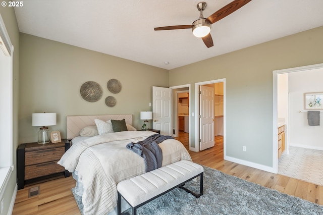 15745 SE Bybee Dr, Portland, OR 97236 - bedroom with light wood finished floors, a closet, baseboards, and a spacious closet