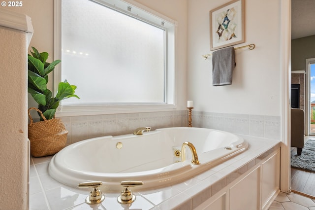 15745 SE Bybee Dr, Portland, OR 97236 - bathroom featuring a jetted tub and tile patterned flooring