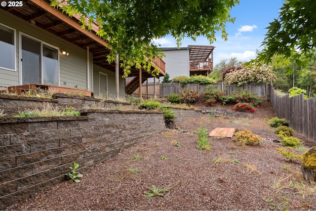 15745 SE Bybee Dr, Portland, OR 97236 - fenced backyard with stairway and a wooden deck