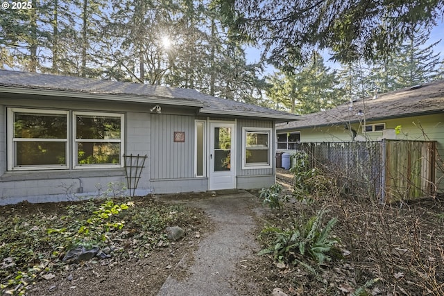 property entrance featuring fence