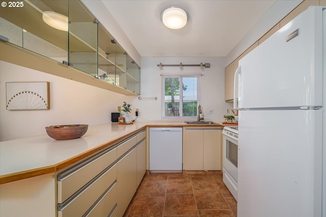12960 SW 5th St, Beaverton, OR 97005 - kitchen with white appliances, light countertops, cream cabinetry, and open shelves