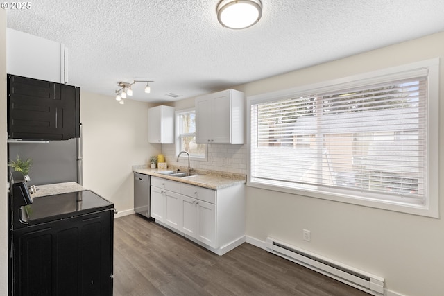 16825 SE Powell Blvd, Portland, OR 97236 - kitchen with black range with electric cooktop, a baseboard heating unit, a sink, dishwasher, and dark wood finished floors