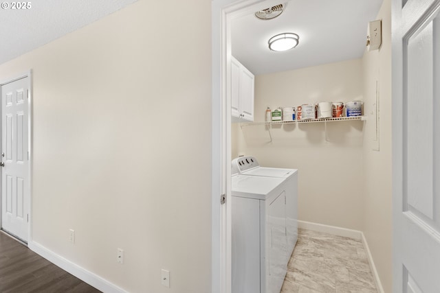 16825 SE Powell Blvd, Portland, OR 97236 - laundry area featuring washing machine and dryer, baseboards, and cabinet space