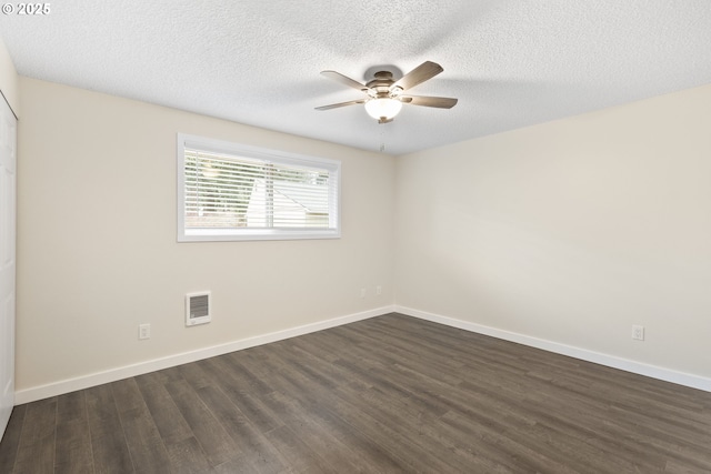 16825 SE Powell Blvd, Portland, OR 97236 - unfurnished room featuring ceiling fan, dark wood-style floors, baseboards, and a textured ceiling
