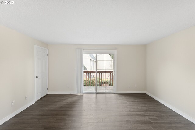 16825 SE Powell Blvd, Portland, OR 97236 - unfurnished room featuring dark wood finished floors and baseboards