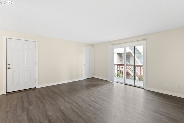 16825 SE Powell Blvd, Portland, OR 97236 - spare room with dark wood-style floors and baseboards