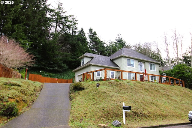 view of front of property featuring a garage