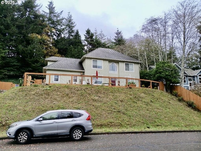 view of front of home with a front lawn