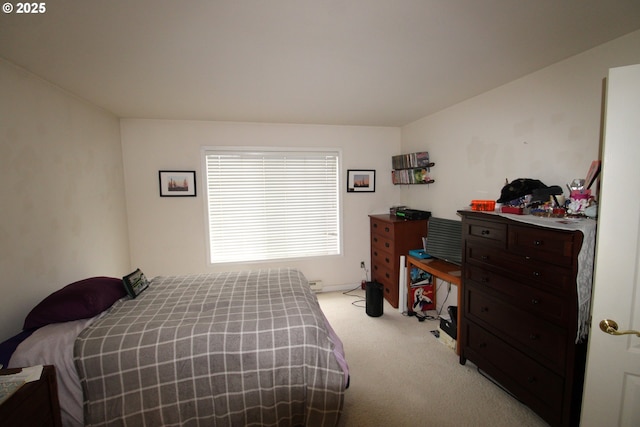 bedroom with light colored carpet