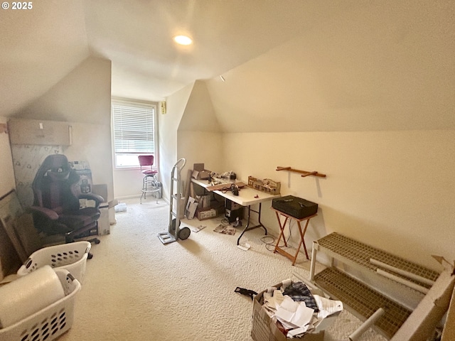 bonus room with lofted ceiling and carpet