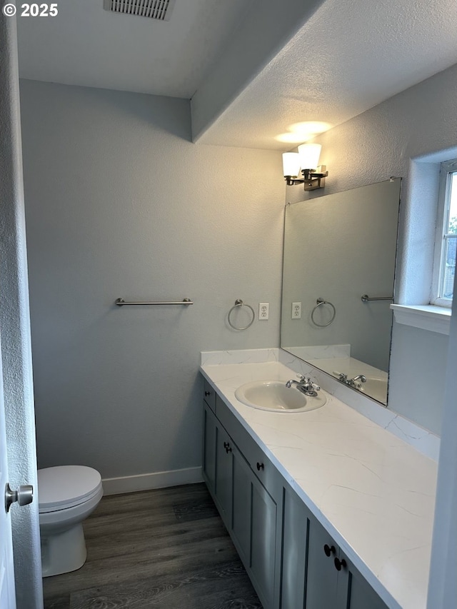 4238 SE 120th Ave, Portland, OR 97266 - bathroom with vanity, toilet, and wood finished floors
