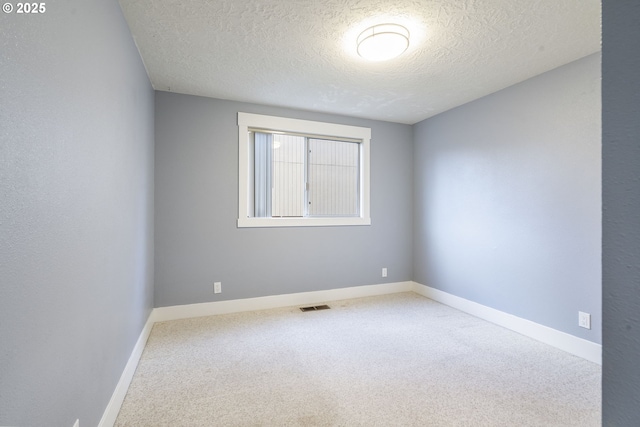 5219 Spring Leaf Ct N, Keizer, OR 97303 - unfurnished room with carpet floors and a textured ceiling