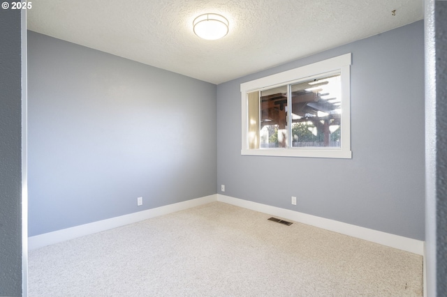 5219 Spring Leaf Ct N, Keizer, OR 97303 - empty room featuring carpet and a textured ceiling