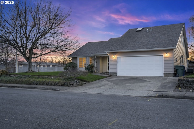 5219 Spring Leaf Ct N, Keizer, OR 97303 - view of front of house featuring roof with shingles, an attached garage, concrete driveway, and a yard