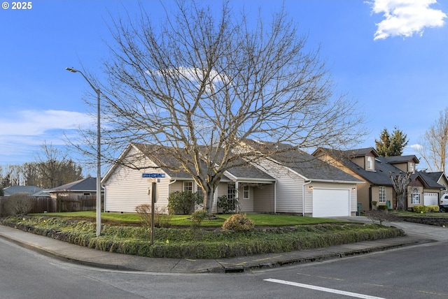 5219 Spring Leaf Ct N, Keizer, OR 97303 - view of front of home featuring an attached garage, a residential view, and driveway