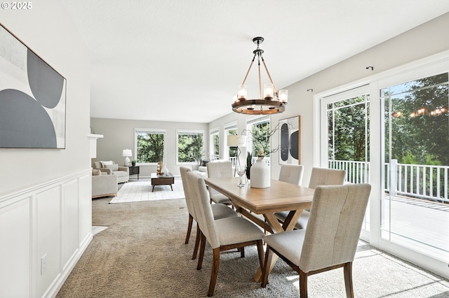 20681 S Wisteria Rd, West Linn, OR 97068 - dining space featuring light colored carpet and a chandelier