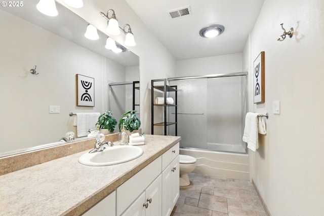 20681 S Wisteria Rd, West Linn, OR 97068 - bathroom featuring vanity, shower / bath combination with glass door, and stone finish floors