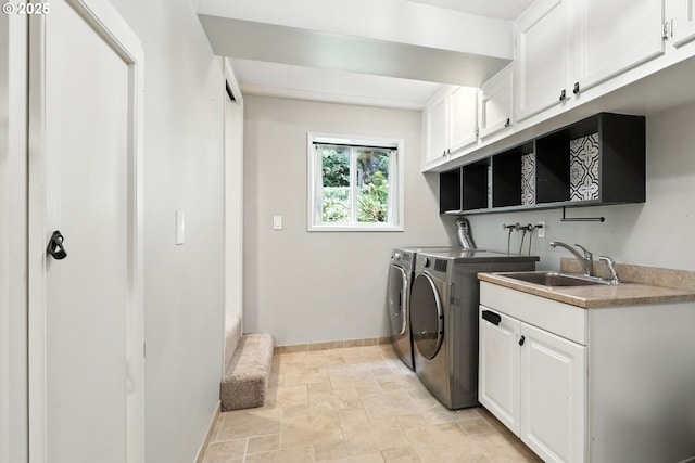 20681 S Wisteria Rd, West Linn, OR 97068 - washroom featuring cabinet space, washing machine and dryer, and stone finish flooring