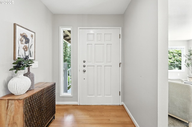 20681 S Wisteria Rd, West Linn, OR 97068 - entryway with light wood-style floors and baseboards